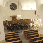 Het Edes Orkest tijdens de volkskerstzangdienst in Bennekom.